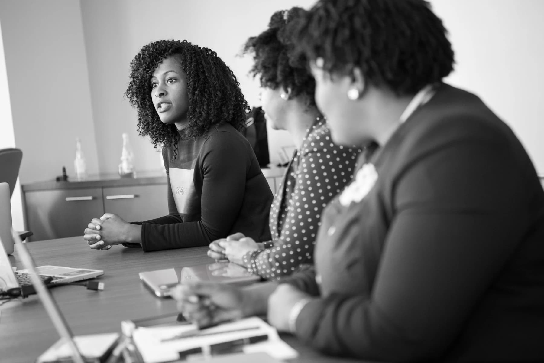 Black women professionals meeting to shape a digital product